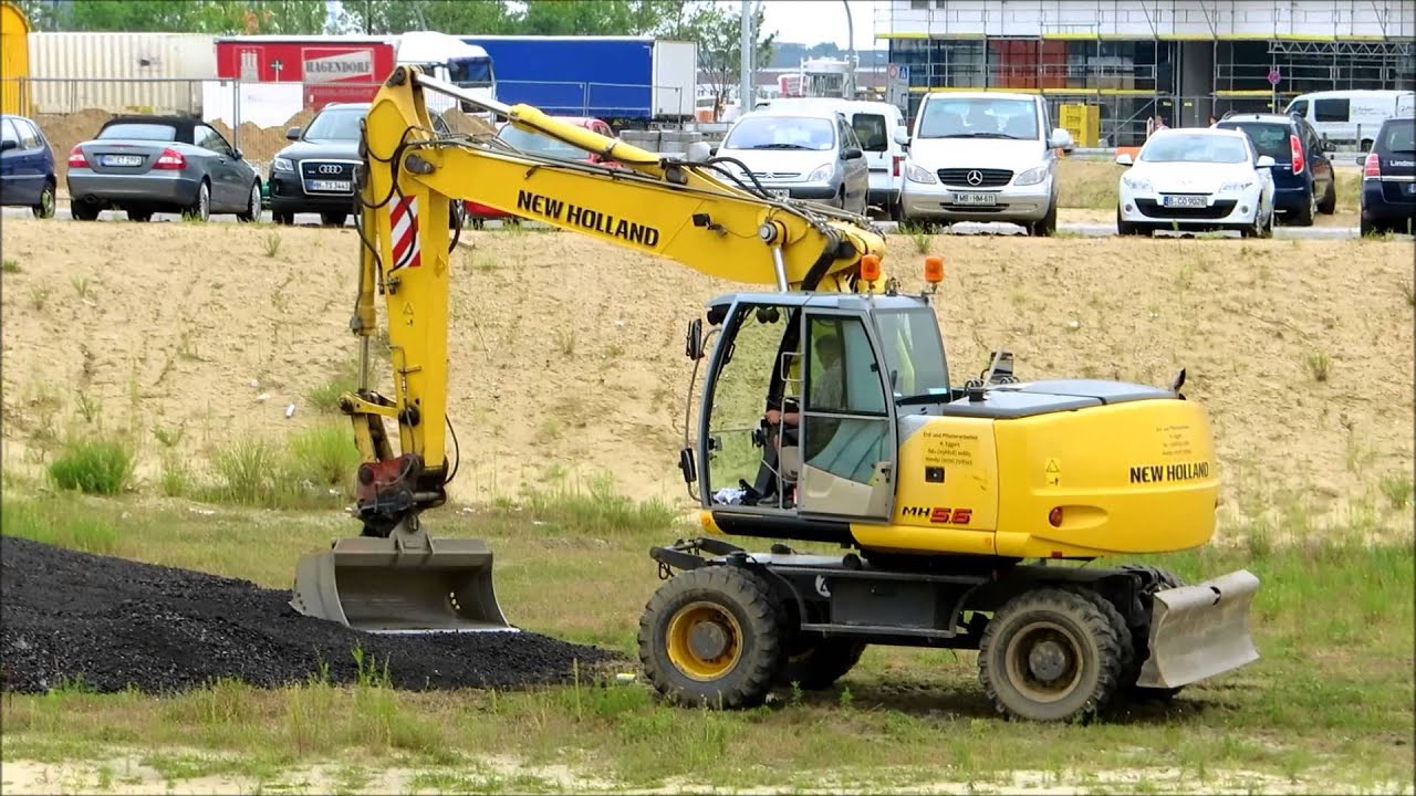 Аренда колесного экскаватора New Holland мн 5.6 в Москве по доступной цене